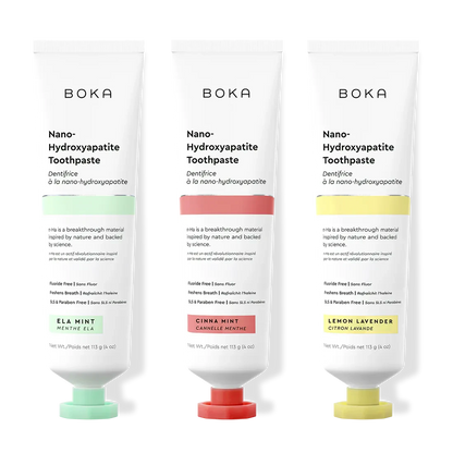 Three tubes of Boka Nano-Hydroxyapatite Toothpaste with different flavors on a white background.