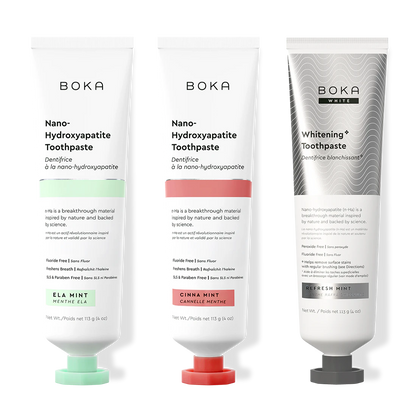 Three Boka toothpaste tubes on a white background