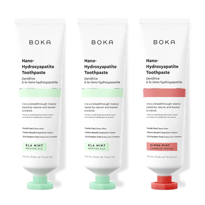Three tubes of Boka Nano-Hydroxyapatite Toothpaste with different flavors on a white background.