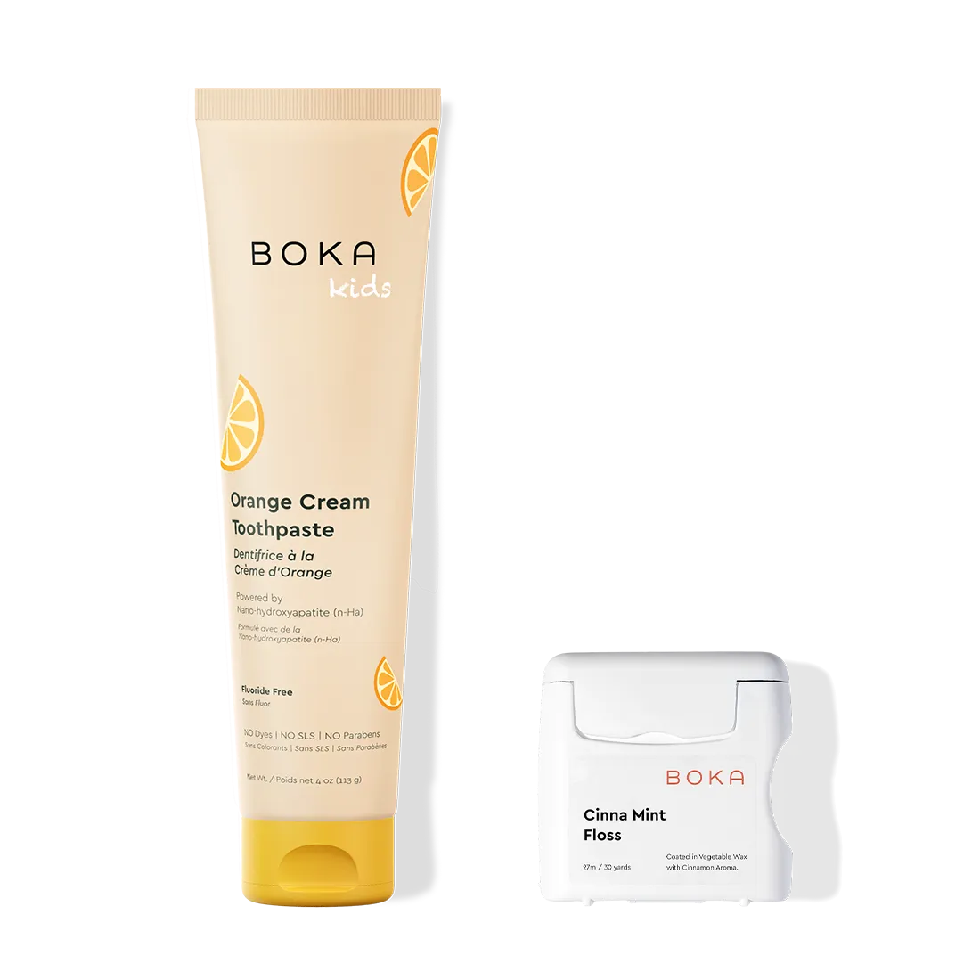 Boka Kids Orange Cream Toothpaste and Cinna Mint Floss on a white background