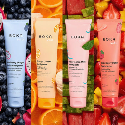 Four Boka Kids toothpaste tubes with fruit-themed designs on a colorful background.