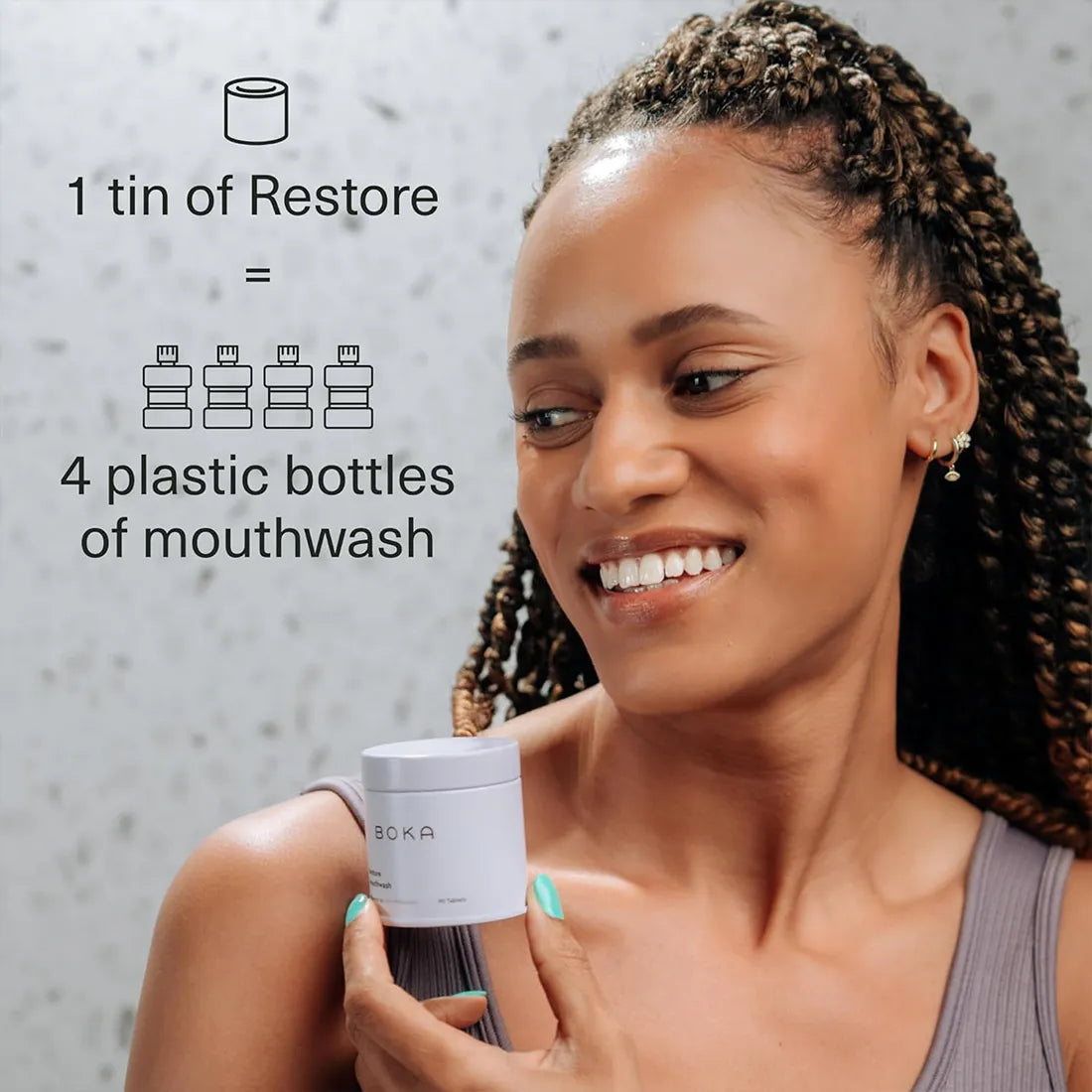 Woman holding a Boka mouthwash container with text about reducing plastic waste.
