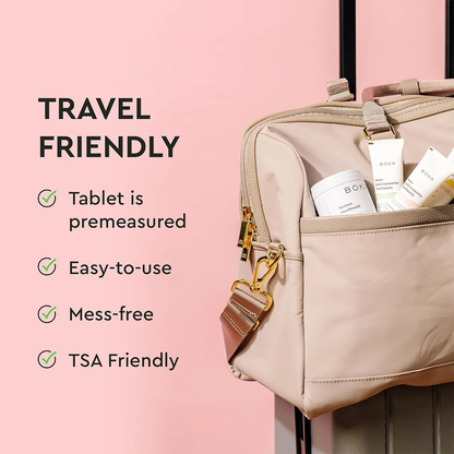 Travel bag with premeasured tablet container on a pink background, featuring text highlighting travel-friendly features.