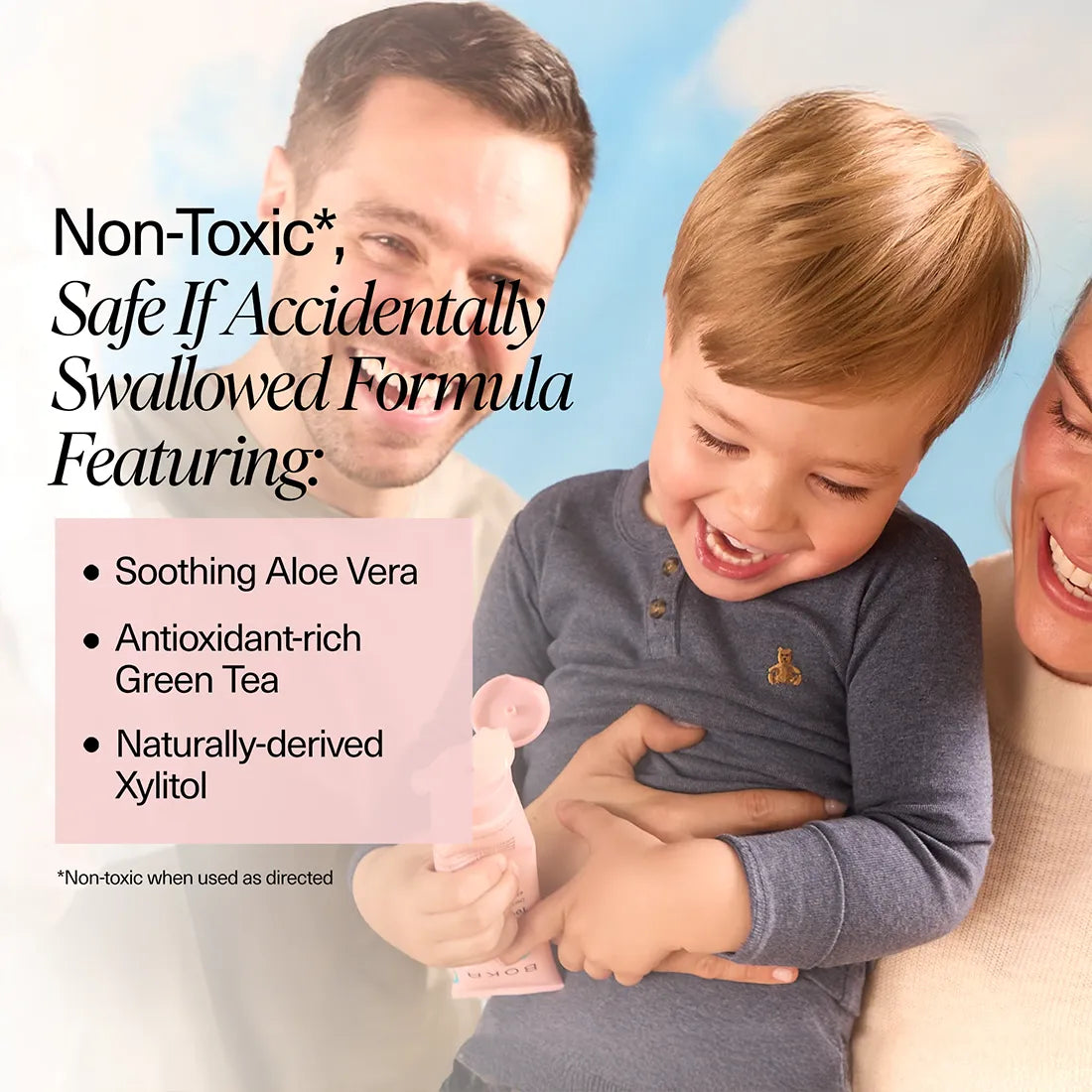 Child holding Boka toothpaste with parents, featuring text about formula ingredients.