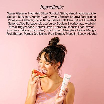 Woman eating watermelon with Boka toothpaste on a pink background, featuring an ingredient list.