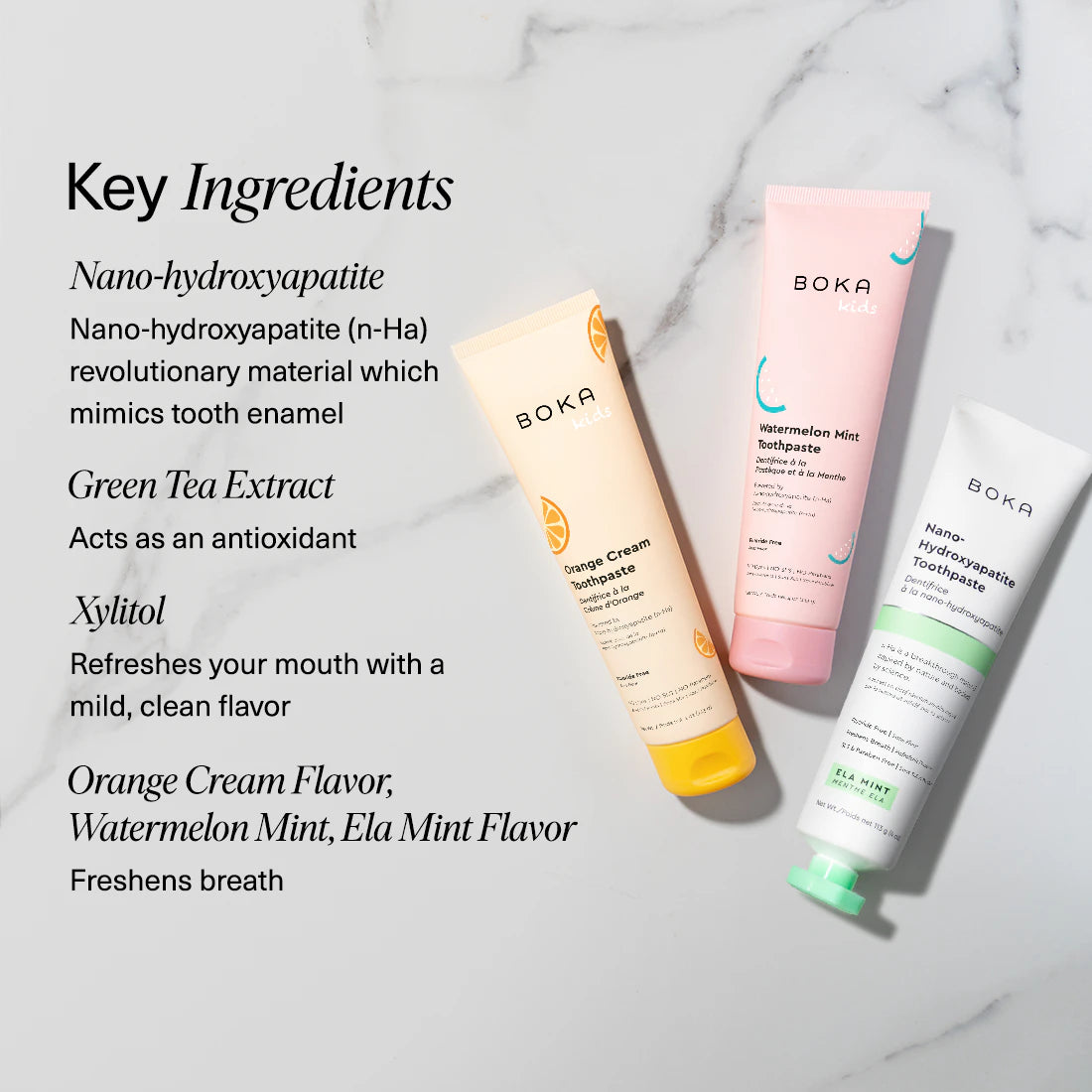 Boka toothpaste tubes on a textured towel with mint leaves, alongside key ingredients listed