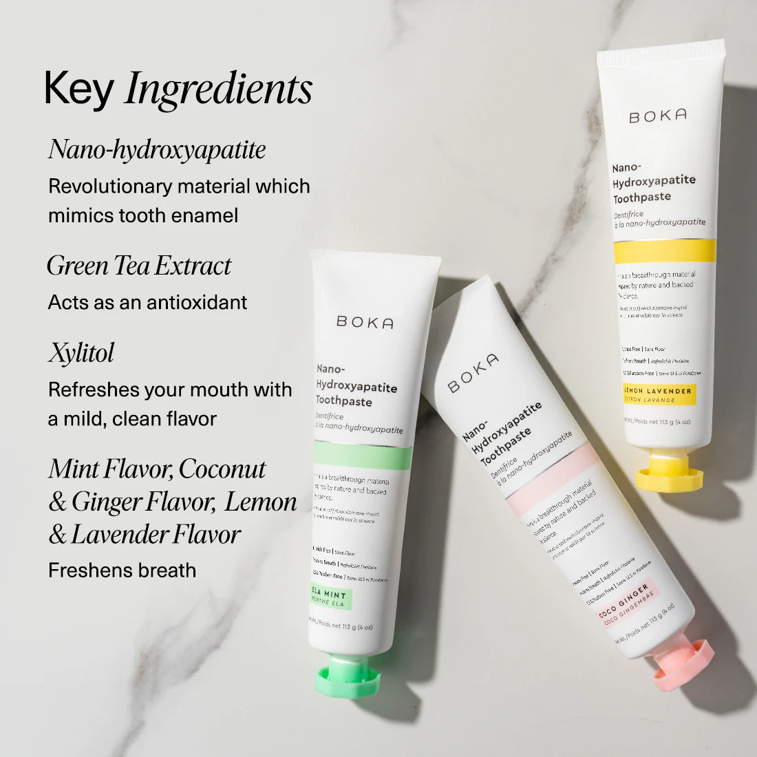 Boka toothpaste tubes on a textured towel with mint leaves, alongside key ingredients listed