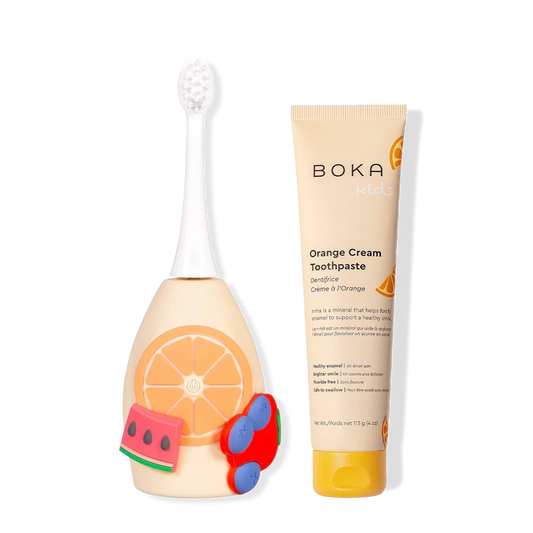 Kids Sonic Kit: kid-friendly sonic toothbrush with fruit designs and Orange Cream n-Ha toothpaste.