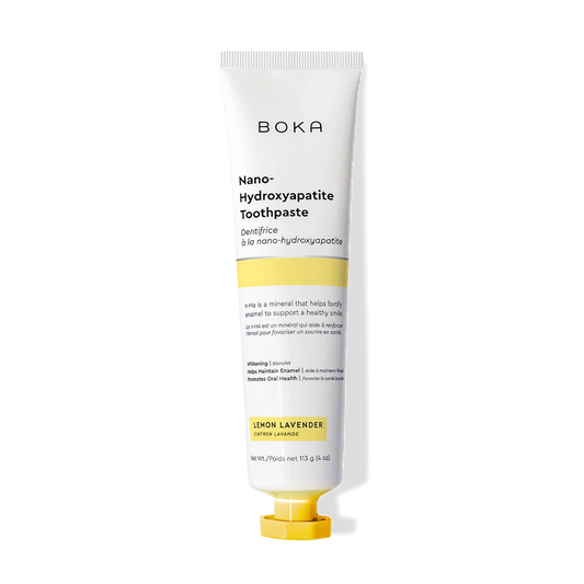 A tube of Lemon Lavender n-Ha Toothpaste to remineralize teeth on a black background.