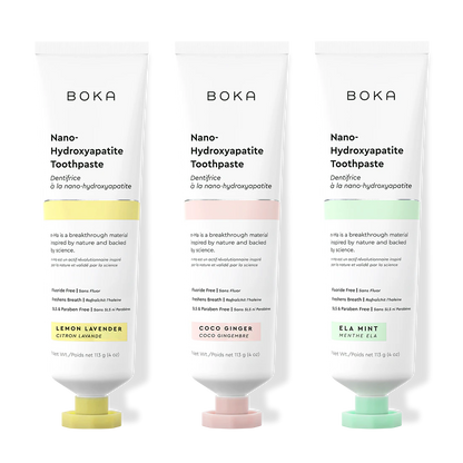 Three tubes of Boka Nano-Hydroxyapatite Toothpaste with different flavors on a white background.
