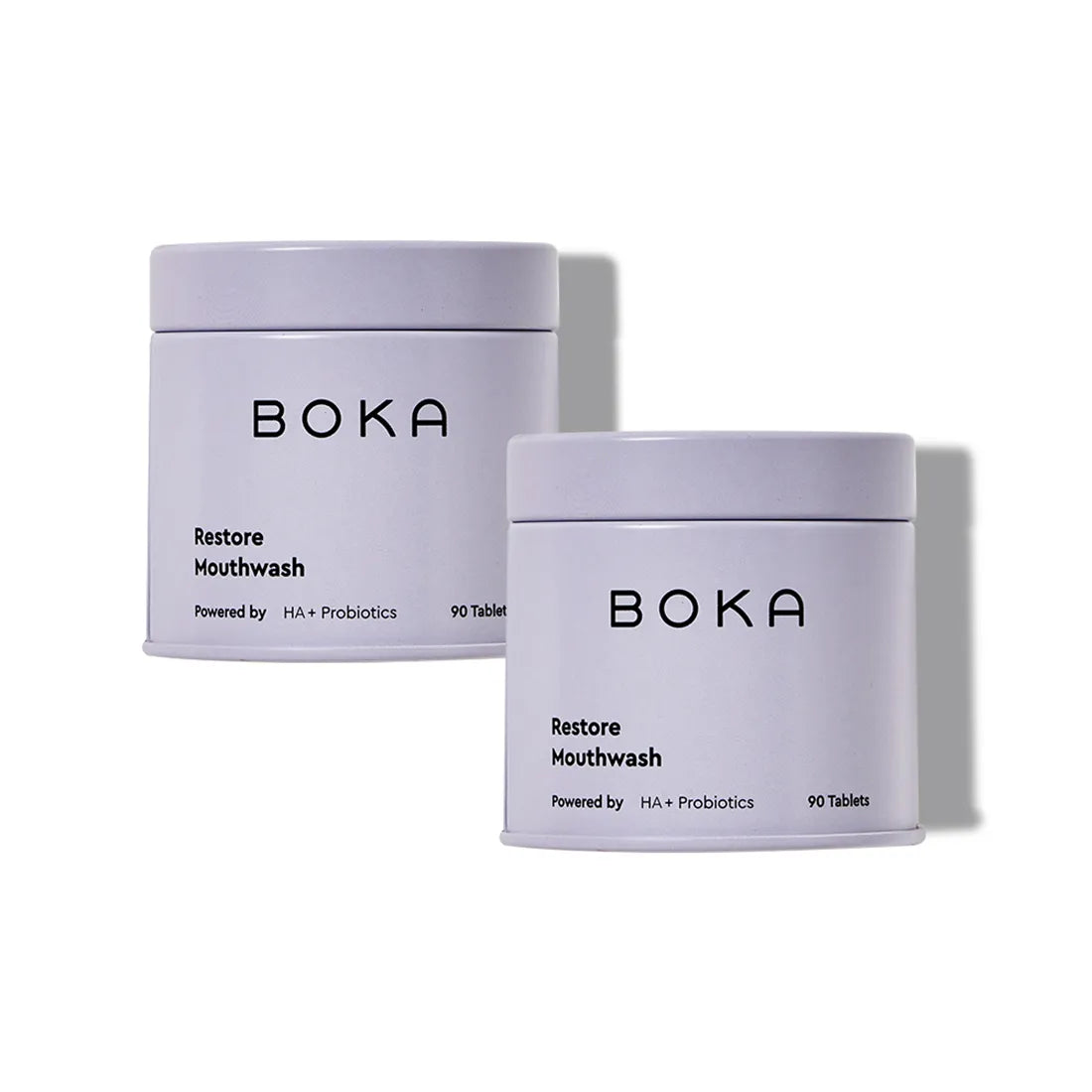 Two containers of Boka Restore Mouthwash on a white background