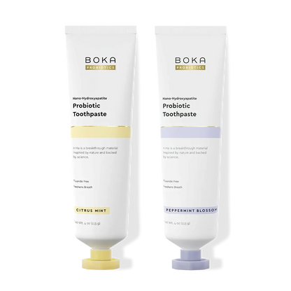 Two tubes of Boka Probiotic Toothpaste on a white background