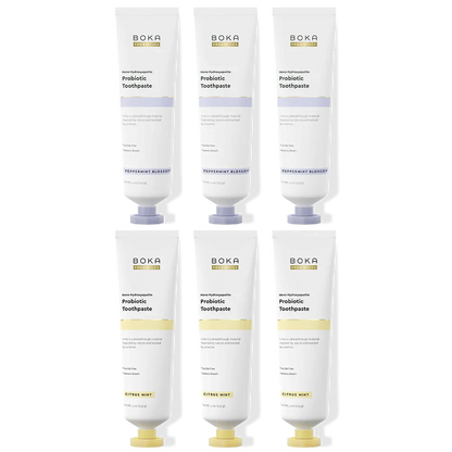 Six tubes of Boka Probiotic Toothpaste on a white background