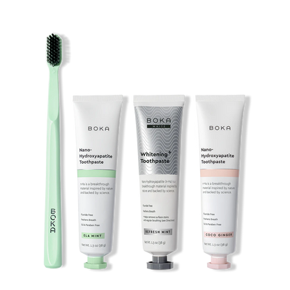 Boka toothpaste and toothbrush on a white background