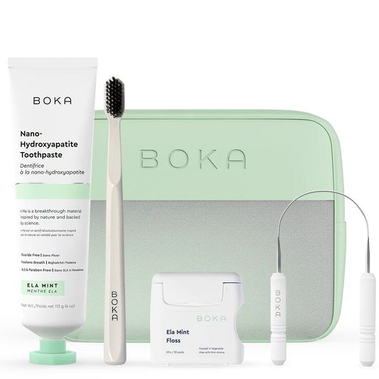 Boka dental care product set including toothpaste, toothbrush, floss, and case on a white background