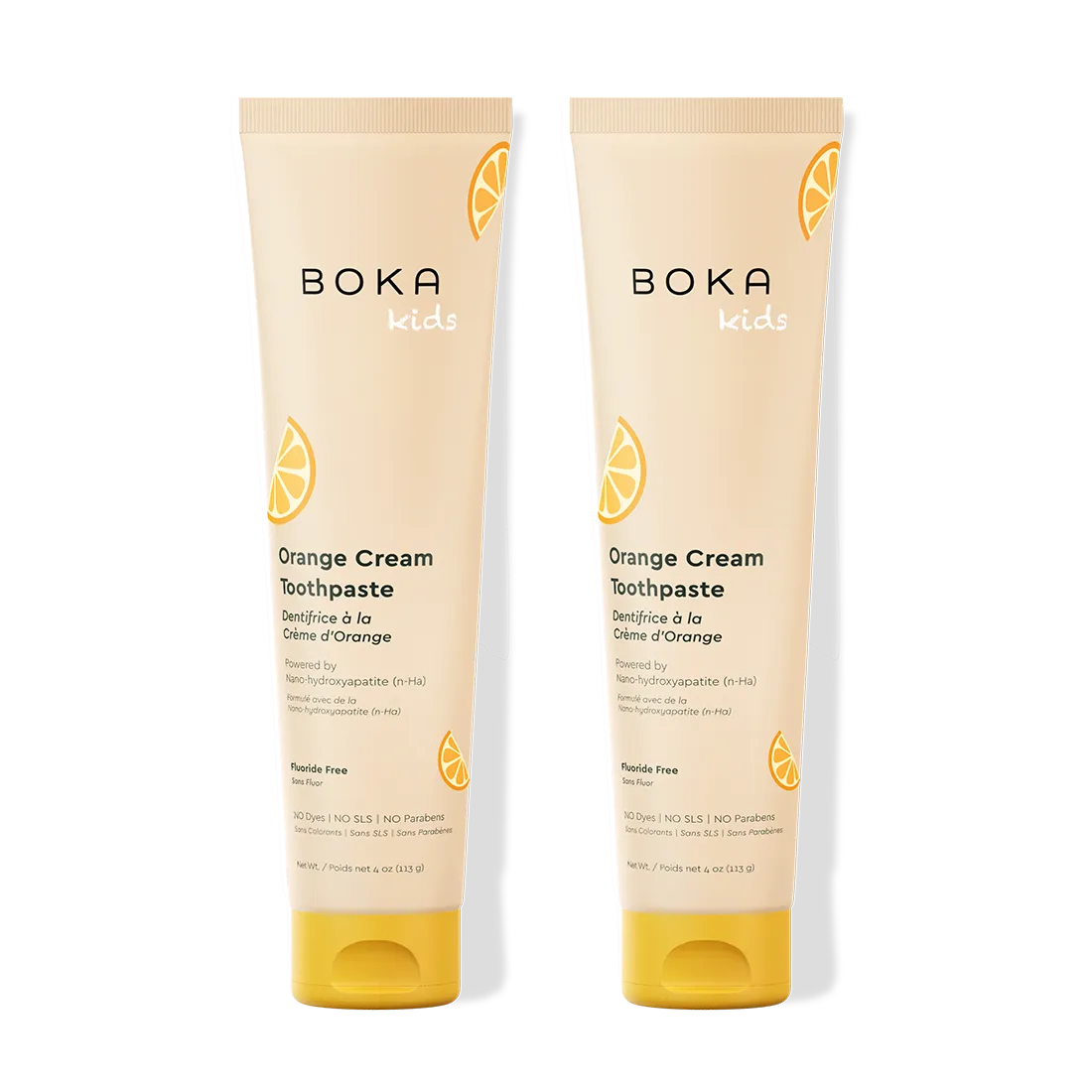 Two tubes of Boka Orange Cream Toothpaste on a white background