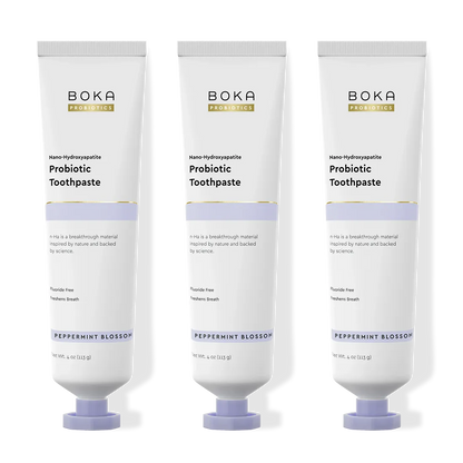 Three tubes of Boka Probiotic Toothpaste on a white background