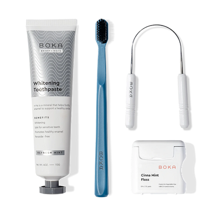 The Starter Kit includes toothpaste, a charcoal toothbrush, a floss pick, and Cinna Mint floss.