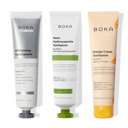 Three Nano (n-Ha) Toothpaste Whitening 3 Packs upright on display.