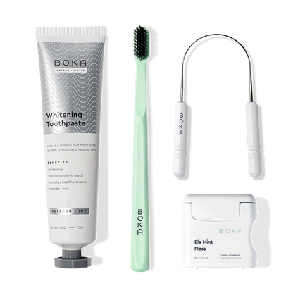 Starter Kit with nano-hydroxyapatite toothpaste and toothbrush arranged on a white background.