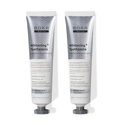 Two tubes of Boka Whitening Toothpaste on a white background