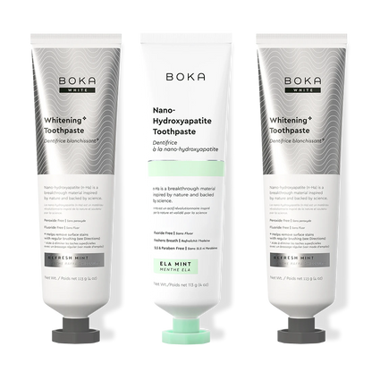 Three bottles of Boka Nano-Hydroxyapatite Toothpaste on a white background