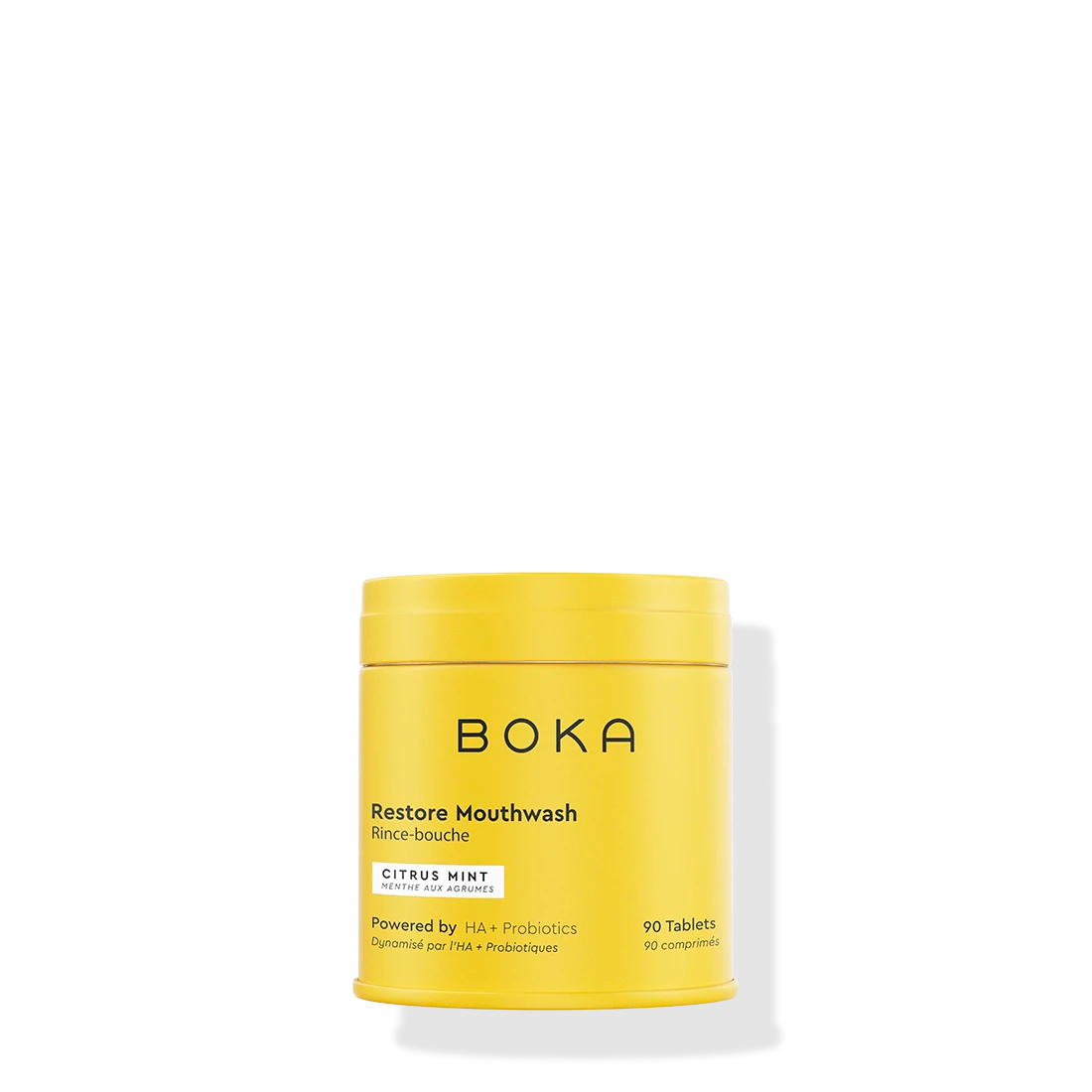 Yellow container of Boka Restore Mouthwash on a white background