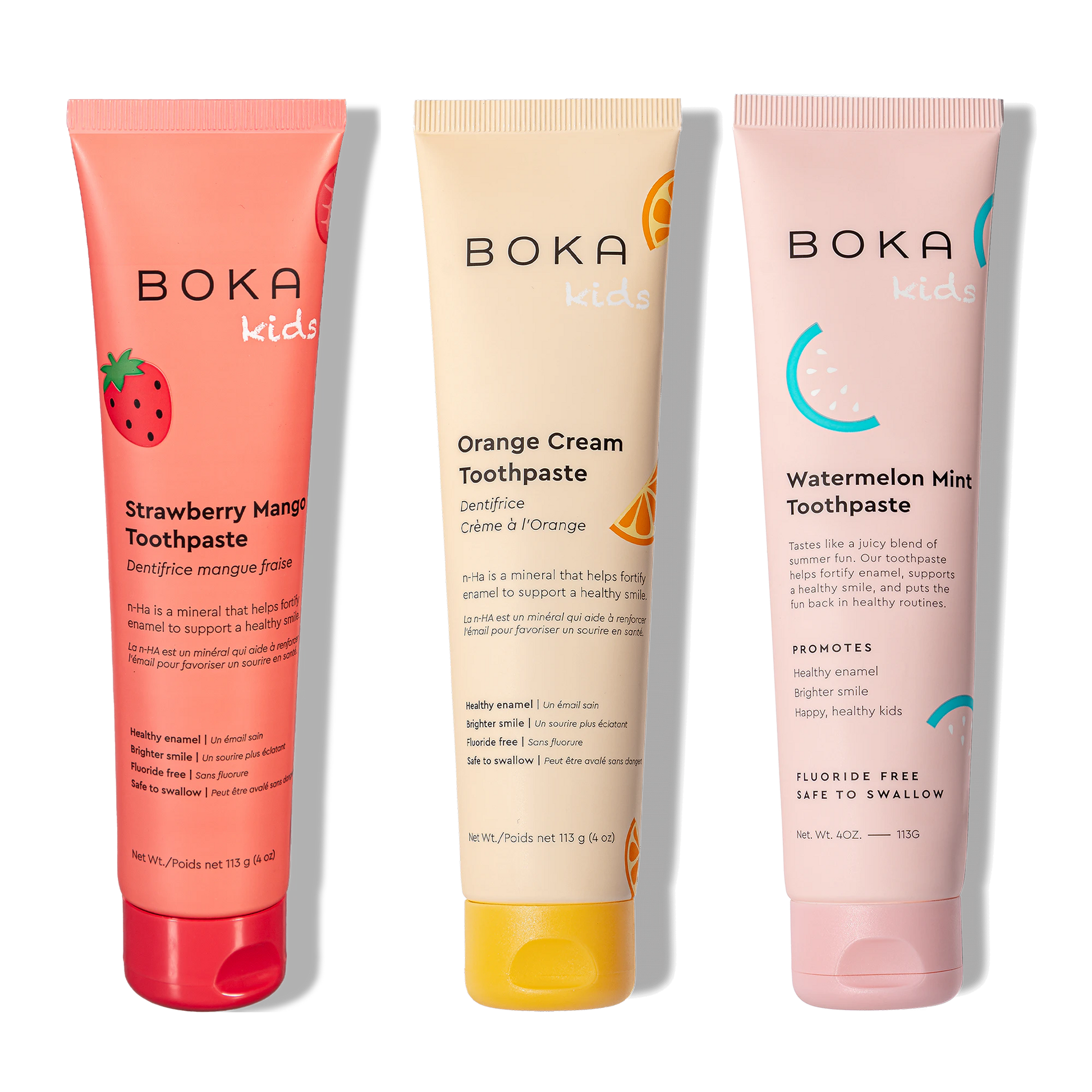 Three tubes of Boka toothpaste with different flavors on a white background