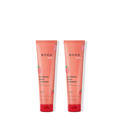 Two tubes of Boka Kids Strawberry Mango Toothpaste on a white background