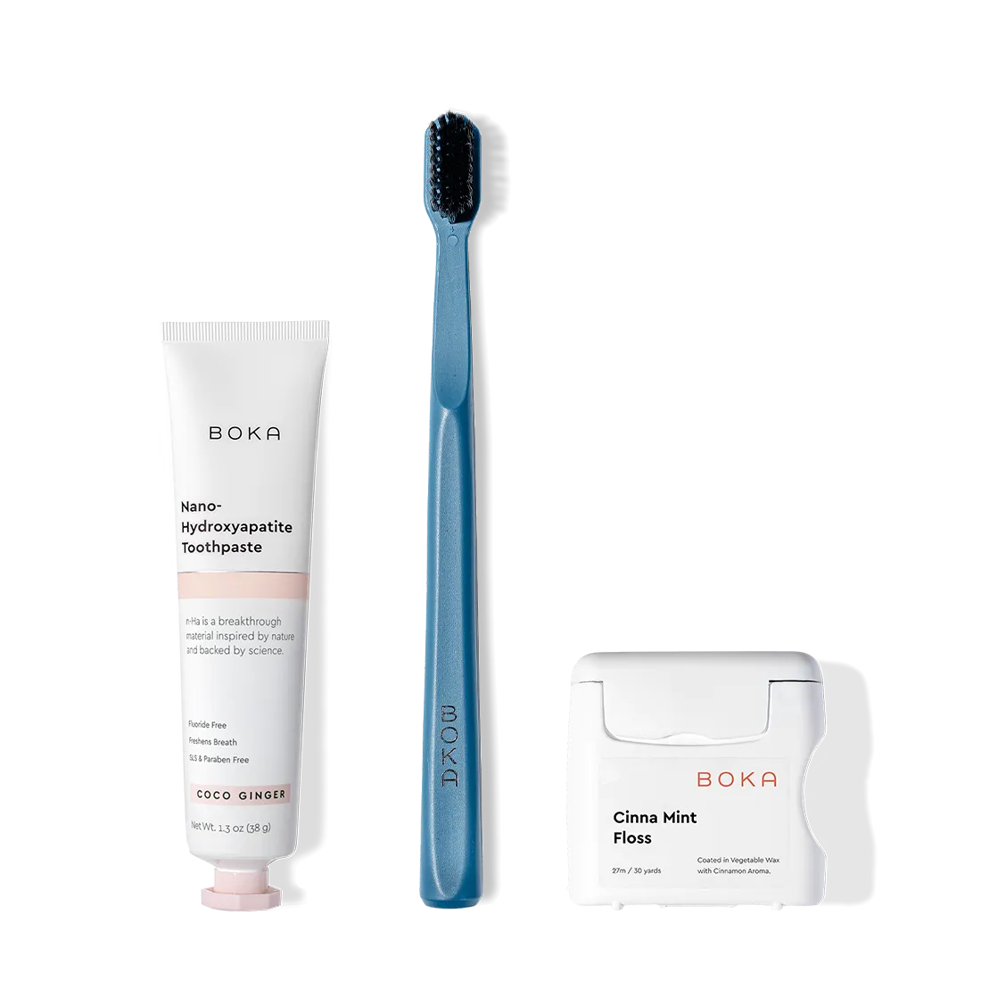 The Travel Kit, featuring Boka toothpaste, charcoal bristle brush, and floss on display.
