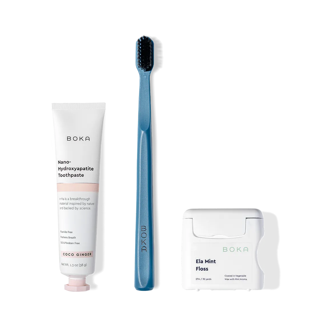 The Travel Kit, featuring Boka toothpaste, charcoal bristle brush, and floss on display.