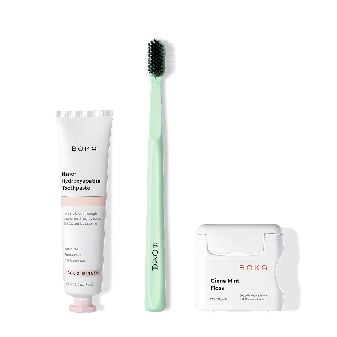 The Travel Kit, featuring Boka toothpaste, charcoal bristle brush, and floss on display.