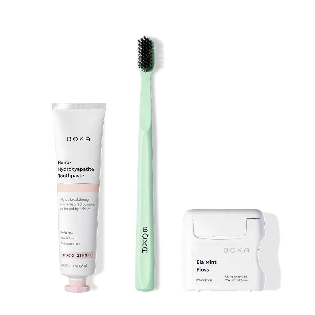 The Travel Kit, featuring Boka toothpaste, charcoal bristle brush, and floss on display.