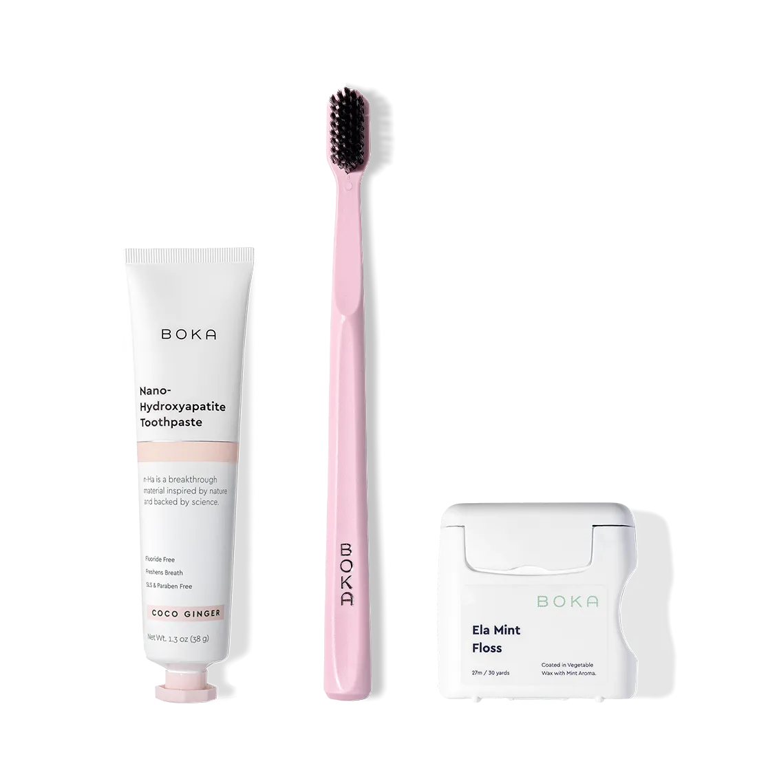 The Travel Kit, featuring Boka toothpaste, charcoal bristle brush, and floss on display.