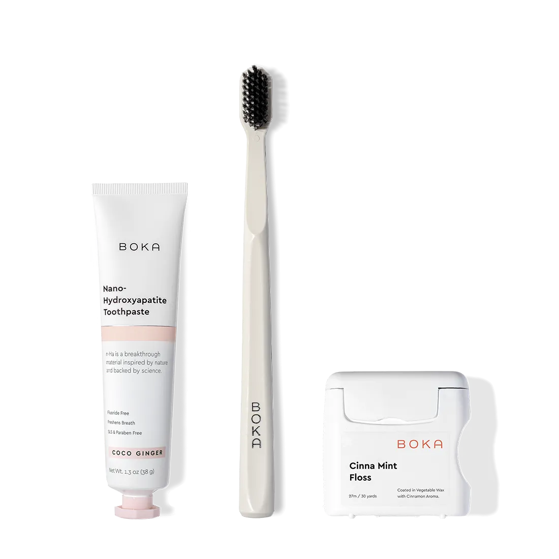 The Travel Kit, featuring Boka toothpaste, charcoal bristle brush, and floss on display.