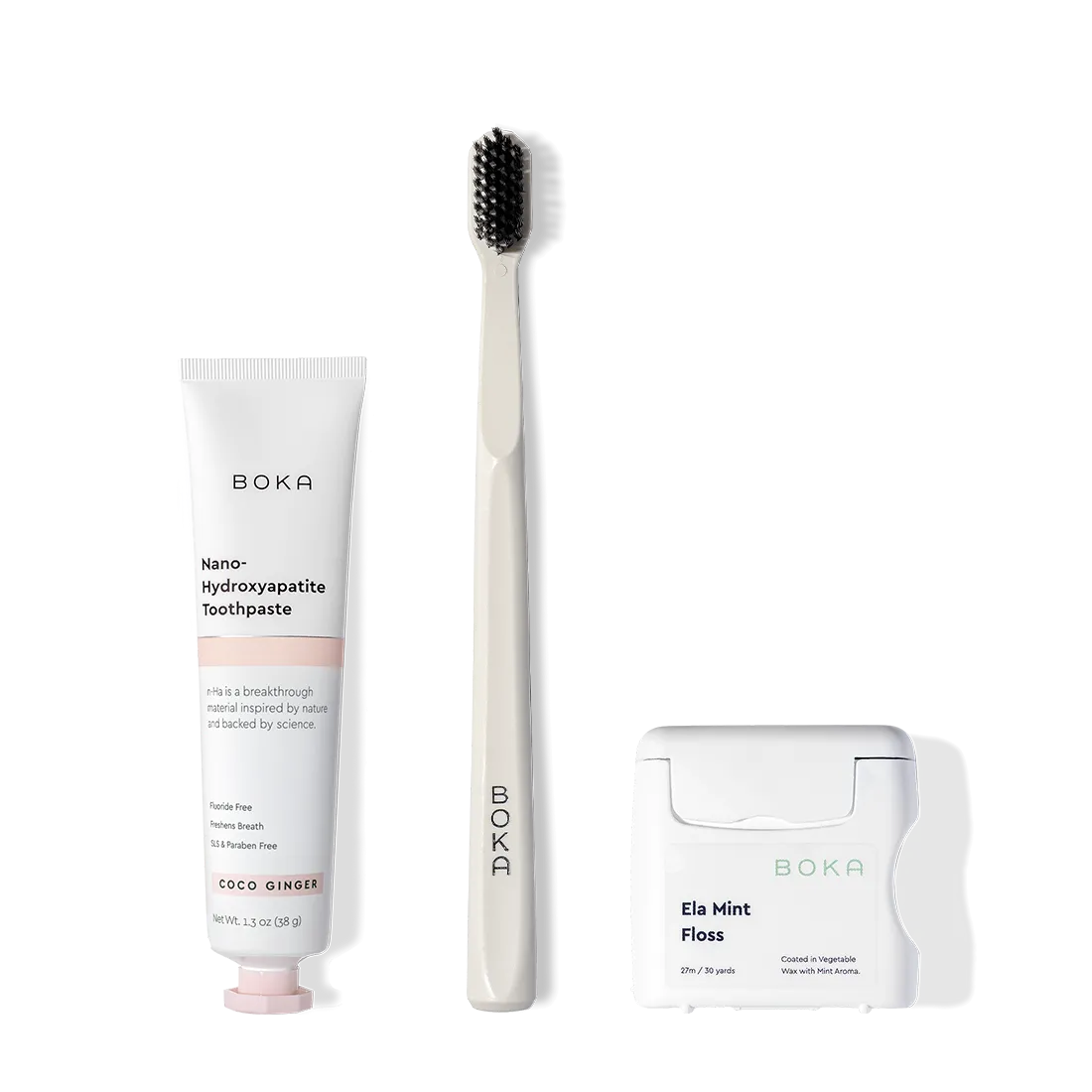 The Travel Kit, featuring Boka toothpaste, charcoal bristle brush, and floss on display.