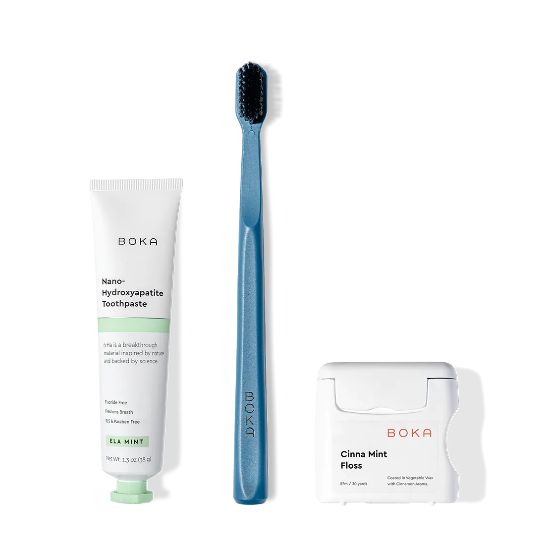 The Travel Kit, featuring Boka toothpaste, charcoal bristle brush, and floss on display.