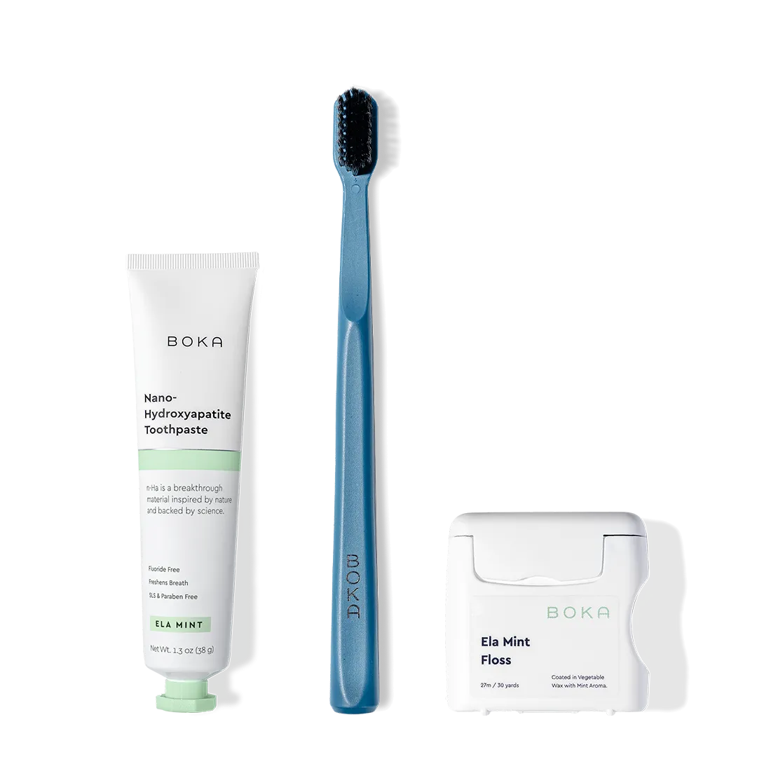 The Travel Kit, featuring Boka toothpaste, charcoal bristle brush, and floss on display.