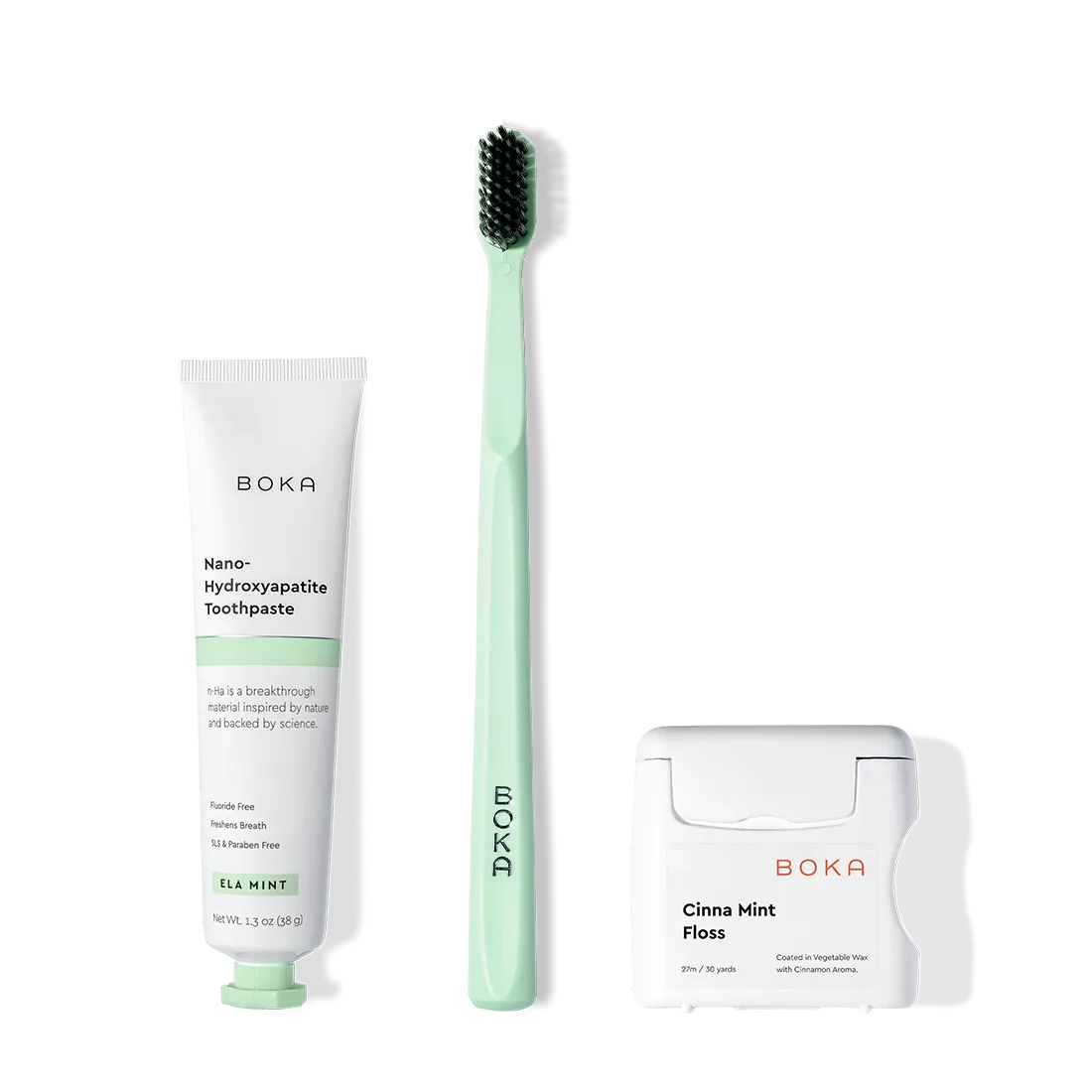 The Travel Kit, featuring Boka toothpaste, charcoal bristle brush, and floss on display.