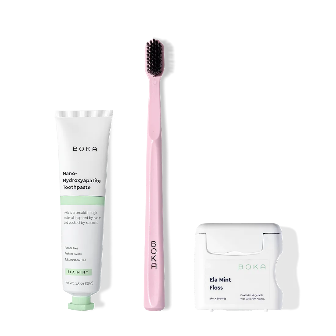 The Travel Kit, featuring Boka toothpaste, charcoal bristle brush, and floss on display.