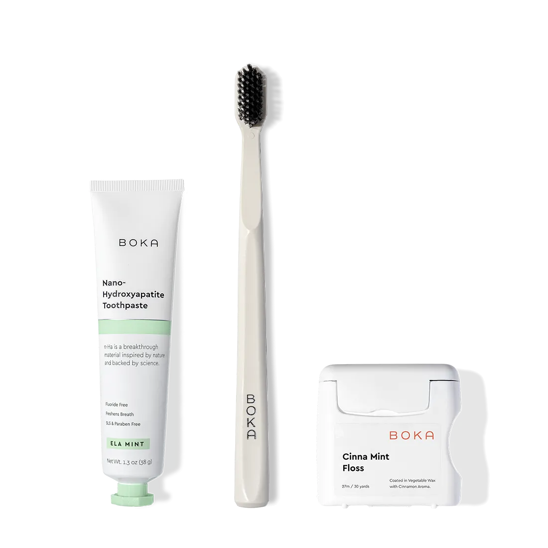 The Travel Kit, featuring Boka toothpaste, charcoal bristle brush, and floss on display.