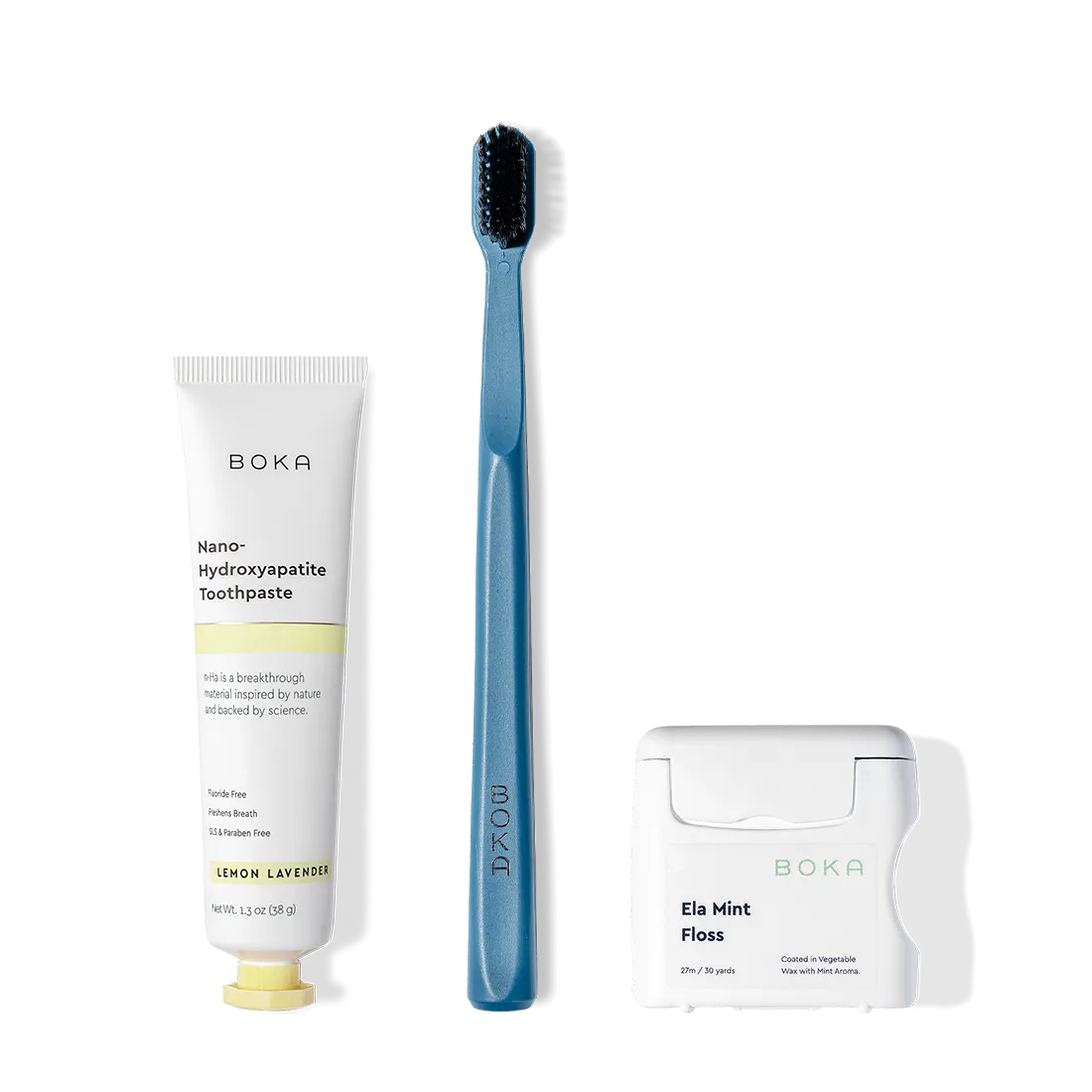 The Travel Kit, featuring Boka toothpaste, charcoal bristle brush, and floss on display.