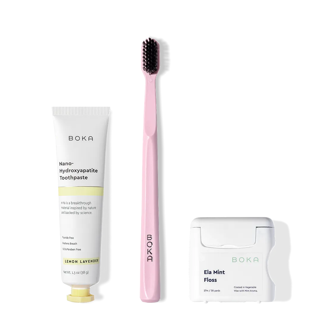 The Travel Kit, featuring Boka toothpaste, charcoal bristle brush, and floss on display.