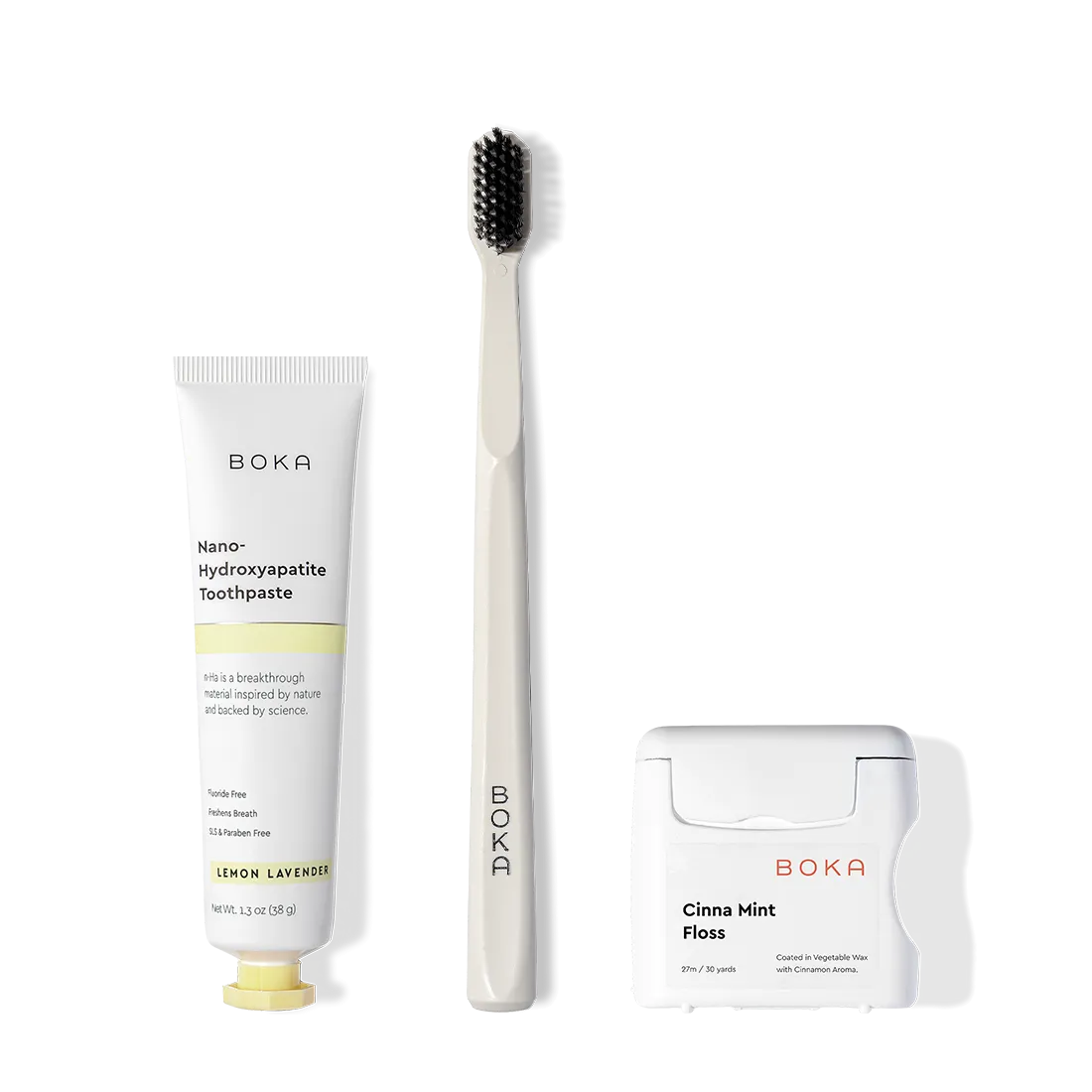 The Travel Kit, featuring Boka toothpaste, charcoal bristle brush, and floss on display.