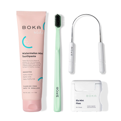 Starter Kit: toothpaste, green brush with charcoal bristles, floss, and tongue cleaner.