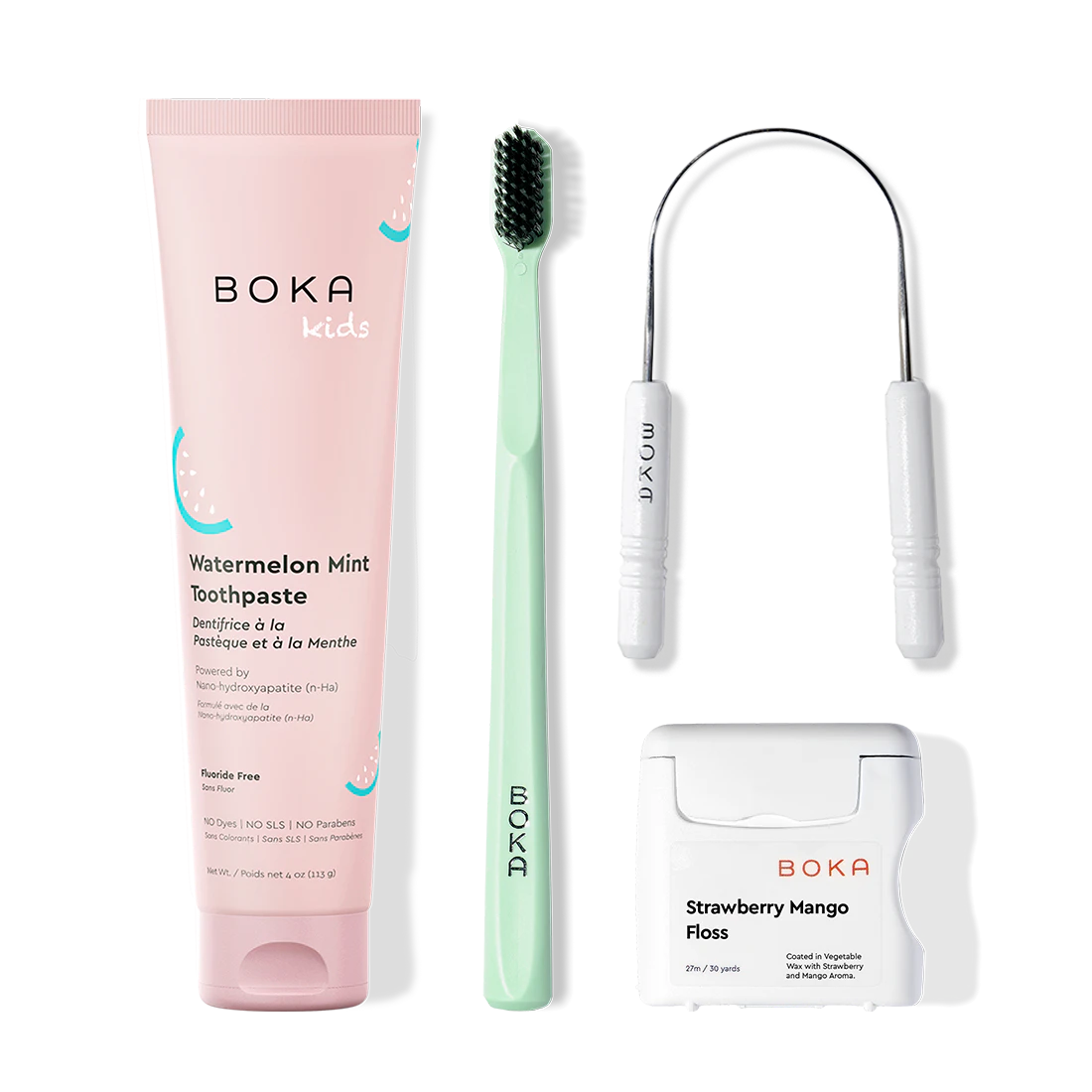 Boka dental care products including toothpaste, toothbrush, Tongue Scraper and floss on a white background