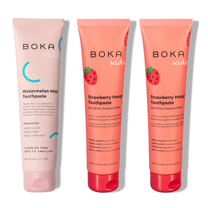 Three tubes of Boka Kids toothpaste, two in strawberry mango flavor and one in watermelon mint flavor, on a white background.