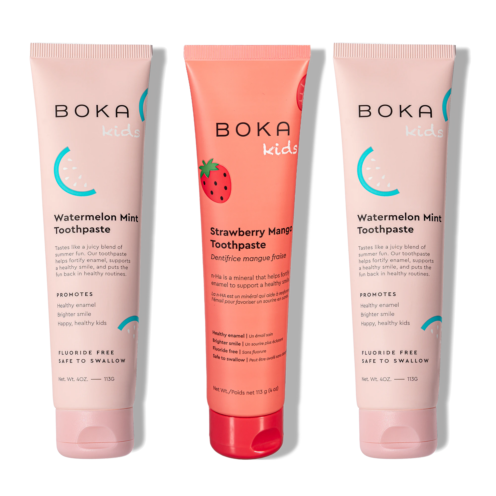 Three Boka toothpaste tubes in watermelon mint and strawberry mango flavors on a white background