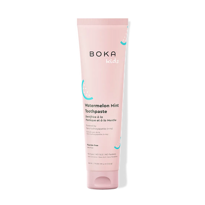 Pink tube of Boka Kids Watermelon Mint Toothpaste on a white background