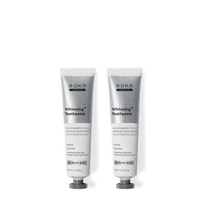 Two tubes of Boka Toothpaste on a white background